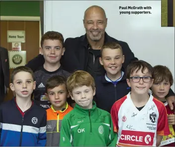  ??  ?? Paul McGrath with young supporters.