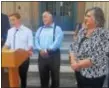  ?? BILL RETTEW JR. – DIGITAL FIRST MEDIA ?? Kathi Cozzone, along with her son and husband, speaks outside the Historic Chester County Courthouse as the county commission­er announces her run for lieutenant governor on Democratic ticket. the