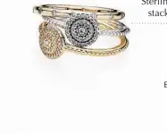  ??  ?? Sterling silver and 14ct gold ring
stack with cubic zirconia $927