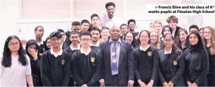  ??  ?? > Francis Elive and his class of A* maths pupils at Fitzalan High School