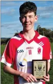  ??  ?? Tinahely’s Oisin O’Gorman was awarded with the Man of the Match award after the game.