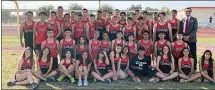  ?? ?? The McFarland boys and girls cross country teams pose for a photo.
