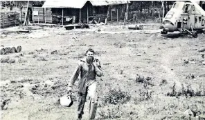  ?? ?? Storrie, above, on operations in Borneo in the 1960s: he sometimes had to land in the jungle using maps that said little beyond ‘Here be dragons’