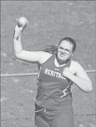  ?? Scott Herpst ?? Sophia Rainwater launches the shot put for the Lady Generals in a home meet this past week. Heritage’s girls held off a charge from Gordon Lee to win the multi-team meet.