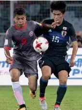  ?? — PTI — AP ?? Japan’s Seiva Baba (right) in action in their Group E match against New Caledoni in Kolkata on Saturday.
