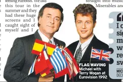  ??  ?? FLAG WAVING Michael with Terry Wogan at Eurovision 1992