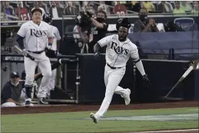  ?? JAE C. HONG — THE ASSOCIATED PRESS ?? The Rays’ Randy Arozarena celebrates after hitting a two-run home run against the Astros in Game 7 of the ALCS on Oct. 17.