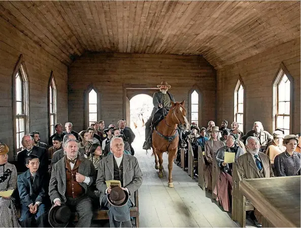  ??  ?? Frank Griffin (Jeff Daniels) decides a visit to church is the best way to intimidate local residents.