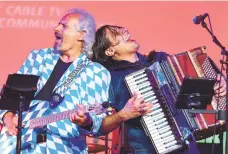  ?? MORNING CALL RICK KINTZEL/THE ?? David Kline, left, performs with Alex Meixner during Musikfest 2020 at the Service Electric TV2 Garage in Bethlehem.