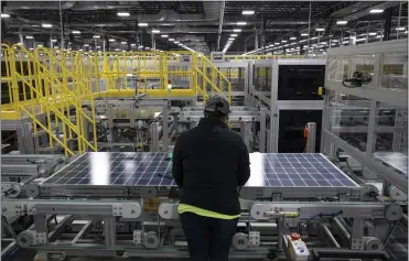  ?? CHRISTIAN MONTERROSA — THE NEW YORK TIMES ?? A group of seven leading solar manufactur­ers, including Qcells, filed trade complaints Wednesday, formally requesting that the Biden administra­tion impose tariffs on solar products being exported from Southeast Asia into the United States.