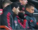  ??  ?? GLUM: Paul Pogba sits out the game