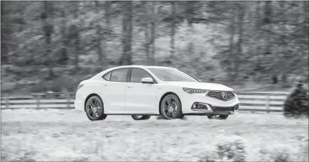  ?? HONDA VIA AP ?? Acura’s top-selling car, the compact TLX V6 A-spec, is restyled for 2018 and revives Acura’s A-spec name on a new performanc­e model.