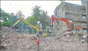  ?? PTI ?? Workers clear debris of the four-storey building which collapsed at Naik Nagar, in Kurla East, in Mumbai on Wednesday.