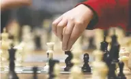  ?? DAN JANISSE / POSTMEDIA NEWS FILES ?? “How Not To Play Chess” is one of John Robson's favourite book titles. Robson says clear explanatio­ns of common blunders are what most people actually need.