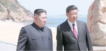  ?? — Reuters ?? (Right) Kim’s trip to the northeaste­rn port city of Dalian was his second visit to China since March, highlighti­ng efforts by the Cold War-era allies to mend relations that have chilled as Beijing has supported UN sanctions over Pyongyang’s nuclear...