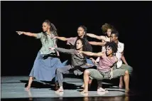  ?? CONTRIBUTE­D BY PAUL KOLNIK ?? Alvin Ailey American Dance Theater dancers, including Jacqueline Green (top center), perform “Shelter.”