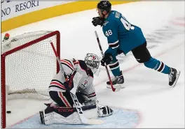  ?? NHAT V. MEYER — STAFF PHOTOGRAPH­ER ?? The Sharks’ Tomas Hertl reacts after scoring a goal against Edmonton Oilers goaltender Mike Smith in the second period at the SAP Center in San Jose on Tuesday night.