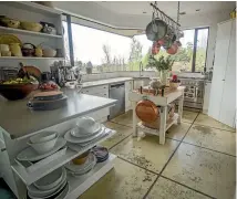  ?? PHOTO: FAIRFAX MEDIA ?? The country style kitchen enjoys stunning views over the garden.