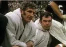  ?? Sport/Getty Images ?? George Blanda and Daryle Lamonica on the sidelines during their time with the Raiders. Blanda would often stand in for Lamonica at quarterbac­k. Photograph: Focus On