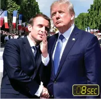  ??  ?? Still holding on: Macron gestures with free hand