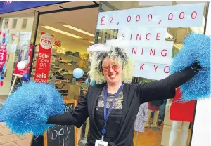  ?? Pictures: Gareth Jennings. ?? Dawn Murray, who has been at the shop for five years, and, below, with manager Carol Andrews, area manager Ken Donaldson, in red, and volunteers.