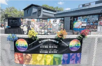  ?? PHOTOS BY RED HUBER/STAFF PHOTOGRAPH­ER ?? The onePULSE Foundation unveiled the interim memorial for the victims and survivors of the Pulse nightclub massacre in Orlando on Tuesday. Planning and design for a permanent memorial and museum is underway.