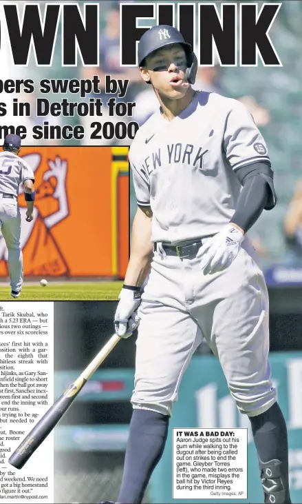  ?? Getty Images; AP ?? IT WAS A BAD DAY: Aaron Judge spits out his gum while walking to the dugout after being called out on strikes to end the game. Gleyber Torres (left), who made two errors in the game, misplays the ball hit by Victor Reyes during the third inning.