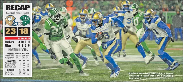  ?? — THE CANADIAN PRESS/KARK TAYLOR ?? Bombers’ Kevin Fogg takes off on a 51-yard intercepti­on return that led to a Winnipeg touchdown.