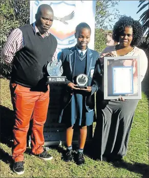  ?? Picture: SUPPLIED ?? GREAT PICK: Andisiwe Sango with parents Andile and Nolukhanyo, after she was inaugurate­d as junior commission­er this week