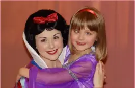  ?? ?? SPECIAL MEMORIES: Darcy with Snow White during a family trip to Euro Disney in 2013. Darcy enjoyed a private audience with Snow White and loved every second.
