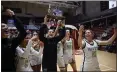  ?? ?? Archbishop Mitty players celebrate after defeating St. Ignatius for the CCS Open Division girls title.
No. 1 Archbishop Mitty 84, No. 6 St. Ignatius 44: