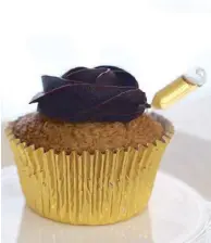  ??  ?? Fundador Cafe's banana cupcake topped with Harvey’s infused dark chocolate ganache