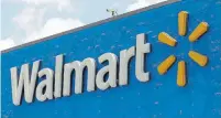  ?? ALAN DIAZ/THE ASSOCIATED PRESS FILE PHOTO ?? Historical­ly, Walmart has been reluctant to cosy up with others, preferring to keep the benefits of any new venture to itself.