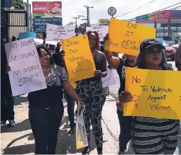  ??  ?? Women and men marching along Barrett Street against crime in Montego Bay and Jamaica.