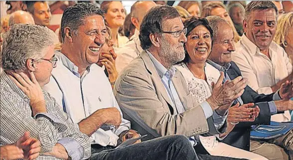  ?? MERCÈ GILI ?? Jordi Cornet, el candidato Xavier García Albiol, el presidente Mariano Rajoy y Dolors López, ayer en el mitin de Lleida