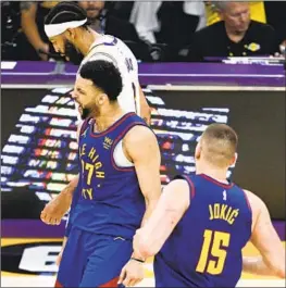  ?? Gina Ferazzi Los Angeles Times ?? JAMAL MURRAY, center, and the Nuggets have matched or topped the Lakers’ adjustment­s at every turn in a reminder of why Denver is the West’s No. 1 seed.