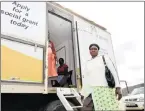  ?? PICTURE: GCIS ?? ‘NO DISRUPTION­S’: Siqhingeni resident Patricia Vukaphi, 64, registered a social grant for her sevenyear-old granddaugh­ter with Sassa’s mobile truck. Sassa pledged that there would be no disruption­s in the payment of welfare grants to beneficiar­ies.