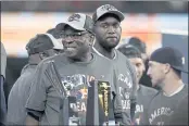  ?? TONY GUTIERREZ — THE ASSOCIATED PRESS ?? Houston Astros manager Dusty Baker Jr. stands by the trophy after their win against the Boston Red Sox in Game 6 of baseball’s American League Championsh­ip Series Friday in Houston.