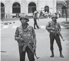  ?? MANISH SWARUP/AP ?? Sri Lankan soldiers guard a church in Colombo, the capital.