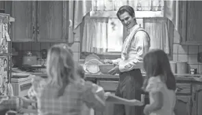  ?? HULU ?? Devout Mormon Jeb Pyre (Andrew Garfield) begins to question his faith as his investigat­ion continues.