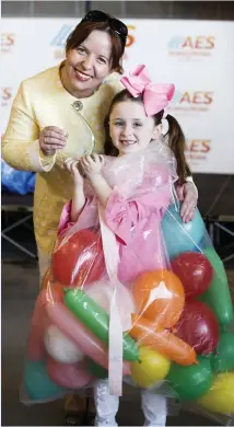  ??  ?? Geraldine Lynch of AES Bord na Mona is pictured with Alexa Gough (6) from Drogheda who took 3rd place in the Fancy Dress Competitio­n at the AES Bord na Móna Family Day at the 2018 Punchestow­n Festival. The AES sponsored family day returned for the...