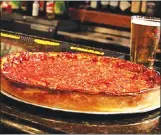  ??  ?? GET A TASTE of Chicago’s world famous deep dish pizza at Marley’s Chicago Style Pizzeria.