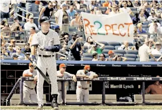  ??  ?? The RE2PECT campaign (above) was a hit with fans and advertiser­s in Jeter’s final season. The power of the number 2 extended to Jeter’s charity, as Mets COO Jeff Wilpon (left) presented the Yankees legend’s Turn 2 Foundation with a check for $22,222.22...