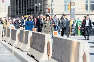  ?? CARLOS OSORIO/TORONTO STAR ?? Temporary barricades were put in front of Union Station in the aftermath of Monday’s attack.