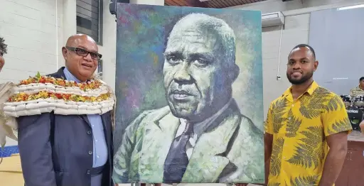  ?? Photo: Laiseana Nasiga ?? From left: Fiji National University Deputy Chancellor Semesa Karavaki with artist Lino Lionel Colatiniya­ra after unveiling Ratu Sukuna’s potrait at the Ratu Sukuna Day Art Exhibition at Nasinu Campus on May 24, 2023.