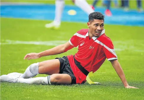  ?? Picture: ROGER SEDRES/IMAGESA/GALLO IMAGES ?? HE’LL BOUNCE BACK: Wayde van Niekerk grimaces after hurting his knee during the Celebrity TAG match between the Aden Thomas All Stars and the Carl Wastie Invitation­al side in Cape Town last year