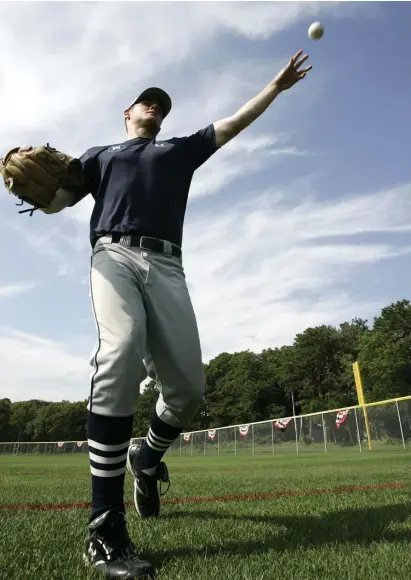  ?? Boston herald File photos ?? IN PLAY: A Harwich Mariners pitcher warms up before a game at the Yarmouth-Dennis Red Sox’ Red Wilson Field. Taking in a Cape League game is, for many, as essential on a visit to Cape Cod as a day at the beach. At left, Newcomb Hollow Beach in Wellfleet.