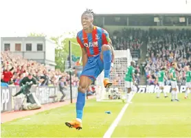  ?? — Gambar Reuters ?? ZAHA meraikan jaringanny­a ketika beraksi bersama Palace pada perlawanan Liga Perdana Inggeris menentang West Brom di Selhurst Park, London pada 13 Mei lepas.