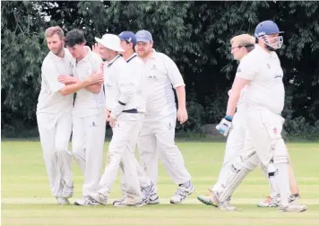  ??  ?? Cheltenham Civil Service fielders celebrate a Tewkesbury wicket