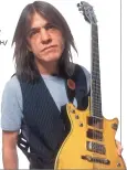  ??  ?? Malcolm Young in 2000. RTKLEIMAN/ MEDIAPUNCH/ IPX